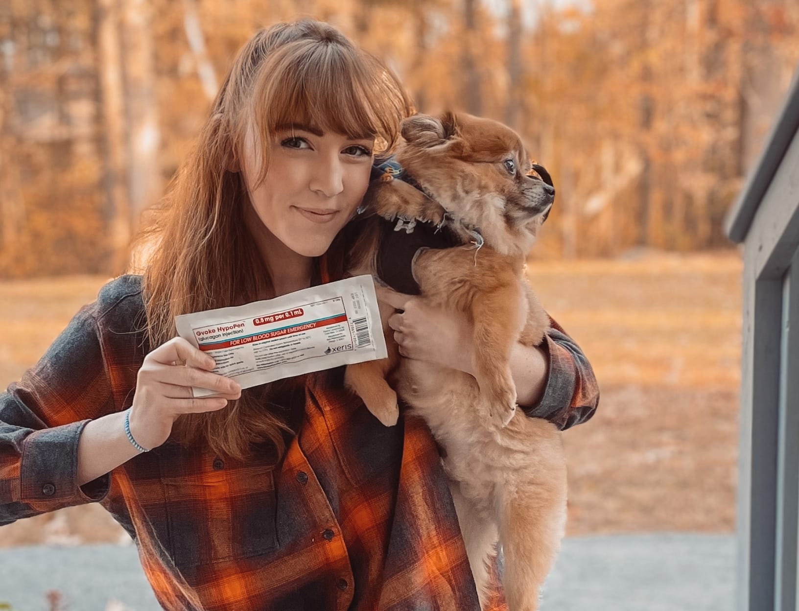 Woman with dog and Gvoke package.