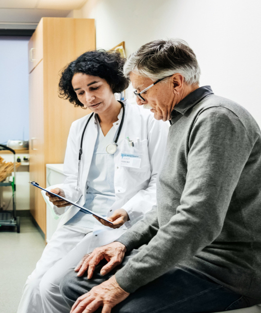 Man talking to doctor