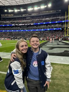 Shiloh and Courtney on football field