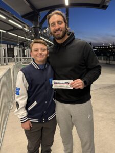 Shiloh and Noah at train stop with Gvoke HypoPen